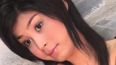 Cute Japanese girl Queen stands in the shower and gets naked